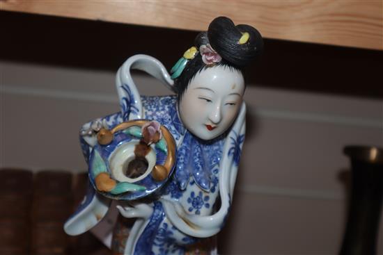 A Chinese famille rose figure of a lady height 33cm